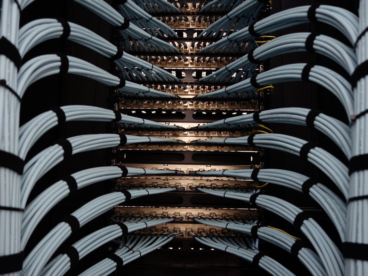 our-story-02 Organized network server cables for efficient data management.
